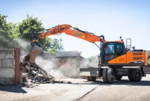 develon-dx140w-7-bager-na-kolesih-3